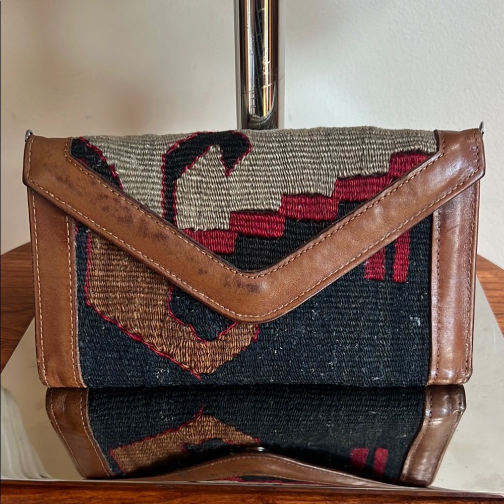 The Loom Alaska patterned Geometric Clutch with Leather Trim